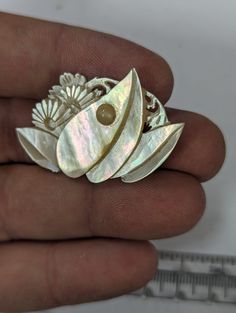 Vintage mother of pearl carved flower, turned into a brooch pin.  Great piece of jewelry for anyone. If you have questions please ask. Combined shipping is offered. Handmade Flower Brooches For Collectors, Unique Flower Brooches For Jewelry Making, Unique Handmade Anniversary Brooches, Pearl Flowers, Pin Badges, Mother Of Pearl, Brooch Pin, Favorite Jewelry, Brooches