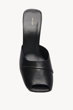 Minimal mule in smooth polished leather with square peep toe and wide stacked heel. Stacked Heel, Mule, The Row, Square, Heels, Leather, Black