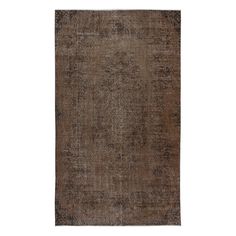 an antique rug with brown tones