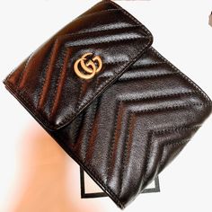 Authentic Gucci Gg Marmont 2.0 Matelasse Chevron Rectangular Waist Bag. Black And Gold Hardware. No Belt No Oval And Round Bag. Just The Rectangular Bag. Comes W/ Dustbag. This Is Part Of The Triple Set. I Am Selling Just The Rectangular Bag (1 Bag) No Belt And 2 Other Pouches. Designer Black Wallet With Gold-tone Hardware, Luxury Black Wallets With Gold-tone Hardware, Designer Black Wallets With Gold-tone Hardware, Luxury Gucci Wallet For Evening, Black Luxury Wallet With Branded Hardware, Black Gucci Wallet For Evening, Modern Black Gucci Wallet, Chic Black Gucci Wallet, Black And Gold Hardware