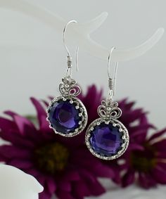 Silver Amethyst Round Wire Wrapped Dangle Earrings, 925 Sterling Silver Designer Handmade Filigree Woman Earrings, Genuine African Amethyst goth drop earrings, silver gift earrings Gemstone: Amethyst 12mm. -The stone used in this jewelry, Amethyst Gemstone, is the February Birthstone. Material: 925 Sterling Silver ( NICKEL FREE ) Length and Width: 4.1cm X 1.5cm // 1.6 Inches X 0.6 Inches These purple stone earrings add a bold fashion statement to any look. The handcrafted designs that make a beautiful fashion statement in that cocktail earrings. This vintage, original, and stylish luxury jewelry is perfect for wearing at parties, festivals and everyday life. FAST AND TRACKABLE SHIPPING FOR ALL EU COUNTRIES AND USA. COMES WİTH VELVET POUCH AND LUXURY GİFT BOX. This earrings, is timeless, an Elegant Lavender Sterling Silver Earrings, Elegant Nickel-free Lavender Earrings, Elegant Lavender Nickel-free Earrings, Purple Round Pierced Earrings, Elegant Sterling Silver Purple Earrings, Purple Sterling Silver Earrings For Formal Occasions, Elegant Purple Sterling Silver Earrings, Pierced Amethyst Crystal Earrings, Elegant Purple Crystal Pierced Earrings