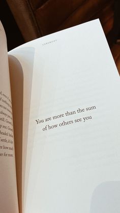 an open book with the words you are more than the sum of how others see you