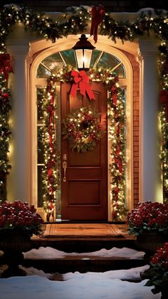 a front door decorated with christmas wreaths and lights