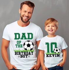 a father and son wearing matching soccer shirts