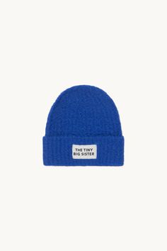 Our classic beanie has a new season update in fluffy alpaca with our signature logo on the front. This bright ultramarine knitted hat is the perfect accessory to your favourite outfits this winter. Warm Blue Beanie Hat, Unlock Screen, One Size Blue Beanie, Warm Blue Beanie One Size, Fluffy Alpaca, Blue One-size Knit Beanie, Blue Handmade One-size Beanie, Tiny Cottons, Knitted Hat