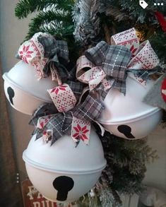 a christmas ornament hanging from the side of a tree