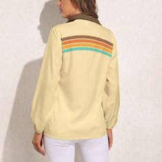 • Embrace the 70s with our 70s Style Top Women, a chic addition to your retro wardrobe.• This Beige Retro Stripe Top Women features a unique upper chest retro stripe print pattern in orange, brown, yellow, and turquoise.• Made from 100% polyester, this Vintage Style Blouse offers comfort and durability.• With its solid contrasting brown collar and elastic cuffs balloon sleeves, this Retro Top Women exudes vintage charm and style.Designed in California by Trendy Hip buys. Handmade to order from. overseas.100% polyester. Retro Long Sleeve Brown Blouse, Retro Long Sleeve Spring Tops, Retro Long Sleeve Tops For Spring, Vintage Fashion Tops For Spring, Vintage Beige V-neck Top, 70s Inspired Long Sleeve Blouse For Fall, 70s Inspired Long Sleeve Fall Blouse, Retro Cream Tops For Spring, Long Sleeve Tops For Vintage Fashion