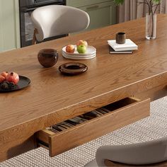 a wooden table with plates and bowls on it