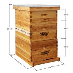 a wooden beehive with measurements for the top and bottom section, including two bees