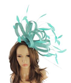 Beautiful Sinamay Loops and Feathers Fasciantor Measures about 12 inches wide, wider with feathers It is mounted with a headband. We will always try and match the fascinator colour to the headband. If the colour is unavailable then we will use BLACK. If you dont want black please state your hair colour at checkout and we will use a band that matches your hair. unsure about colour? We send can send free colour samples anywhere in the world. Simply email us with colours and address. Samples can ta Elegant Turquoise Headpiece For Wedding, Elegant Turquoise Wedding Headpiece, Elegant Turquoise Fascinator For Races, Elegant Turquoise Fascinator For Wedding, Turquoise Fascinator For Spring Wedding, Elegant Turquoise Fascinator For Kentucky Derby, Elegant Turquoise Fascinator For Royal Ascot, Turquoise Headpieces For Kentucky Derby, Turquoise Headpiece For Kentucky Derby Races