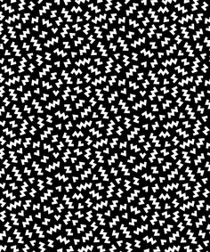 an abstract black and white background with many small stars in the shape of arrows, which are