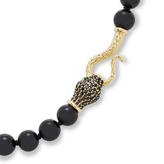 Rarities Black Onyx and Multigemstone "Snake" 20" Necklace  Polished black onyx beads provide the body of this sleek, "snake" necklace. Its decorative clasp, embellished with elegant black spinel and green tourmaline stones, completes the unique design and makes it one you can wear a multitude of ways.        Approx. 20"L x 5/16"W      Stamped .925; 22-24K yellow gold plating     Necklace comprised of round, black onyx beads      Decorative gold-plated "snake head" clasp with pavé-set black spin Luxury Black Beads Jewelry For Formal Occasions, Luxury Formal Jewelry With Black Beads, Luxury Black Polished Beads Jewelry, Luxury Black Polished Bead Jewelry, Formal Onyx Jewelry With Black Beads, Luxury Black Jewelry With Polished Beads, Black Onyx Single Strand Jewelry, Black Snake Shape Necklace For Gift, Black Snake Shape Necklace Gift