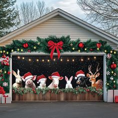 a garage decorated for christmas with animals and presents on the front door, surrounded by holiday decorations