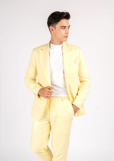 Experience true elegance in this Liberty Light Yellow Linen Suit. Handcrafted from 100% linen, this eye-catching custom made suit will make you look and feel like a million bucks with its bright and stylish summer vibes. Perfect for stand out occasions, your exquisite outfit will turn heads. Luxury Semi-formal Suits For Spring, Tailored Linen Summer Blazer, Notch Lapel Sets For Summer Workwear, Summer Tailored Linen Blazer, Summer Notch Lapel Workwear Sets, Fitted Linen Blazer For Spring, Notch Lapel Summer Sets For Workwear, Fitted Linen Summer Suits, Elegant Linen Summer Sets