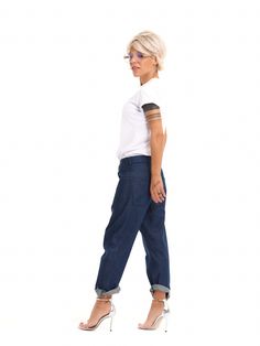 Nothing beats a classic pair of jeans. Ours are cut in a relaxed style that goes well with your favorite tops for a cool look that can be styled up or down. FEATURES:Mid-rise jeans with functional pockets and a button and zipper closure. Please note that this piece is unhemmed on purpose.100% Handmade. SIZE & FIT: Fit: A relaxed fit with room to moveModel is wearing size Small or S/M View our SIZE CHART before ordering MATERIALS & CARE: Content: Denim Care: Machine wash on cold (30ºC) with a mild detergent. SHIPPING: Made to order, processing time is 15 working days This item will be shipped via DHL Relaxed Jeans, Mid Rise Jeans, Relaxed Style, How To Better Yourself, Mid Rise, How To Look Better, Relaxed Fit, Unique Designs, How To Wear