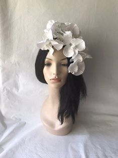 This is a sophisticated, elegant white orchid flower fascinator hat ideal as a bridal wedding fascinator hat or bridal shower headpiece, Diner en Blanc, church, Kentucky derby, high tea or any other special occasion. Easy to wear Worn on both side Free standard shipping 5-7 business days Priority shipping 2-3 business days Express shipping 1-2 business days Orchid Flower Crown, Blue Wedding Headpiece, Floral Fascinator, Garden Hat, Special Occasion Hats, Floral Fascinators, Red Fascinator, Kentucky Derby Fascinator, Bridal Tea Party