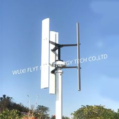 an outdoor television antenna on top of a pole