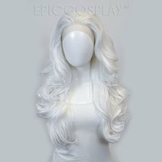 Astraea Classic White Long Wavy Lace Front Wig Astraea has gentle cascading waves, with just the right amount of bounce and curl to make her a gorgeous addition to any collection! Measuring from lace front to end, the fibers are approximately 29" long. The back is about 18" from the nape of the neck to where the wig ends. The unventilated lace is 13" x 1.25", while the ventilation is approximately 2" deep. The long wavy fibers make Astraea perfect to style for a variety of characters like Poison Roxy Cosplay, Astarion Cosplay, White Wigs, White Rabbit Costumes, Fantasy Ball, White Wig, Drag Wigs, Blonde Wigs, Personal Closet