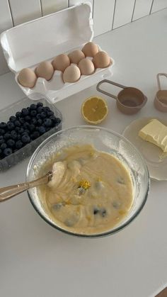 the ingredients for blueberry cheesecake are in bowls and ready to be put into the oven