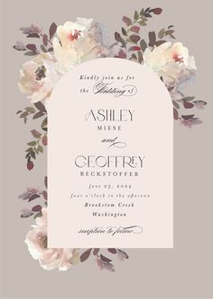 an elegant wedding card with flowers and leaves