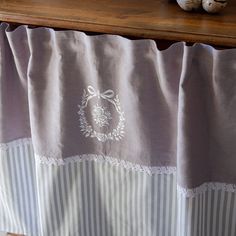 a close up of a curtain on a table