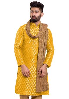 Art Chanderi Silk Jacquard Kurta in Mustard. This Readymade attire with Cotton Lining is Woven in Ornamental Motifs and is Crafted in Chinese Collar Neck and Full Sleeve. Available with a Matching Mask.Do note: Stole, Bottom and Footwear shown in the image is for presentation purposes only. Half to one inch may vary in measurement. (Slight variation in actual color vs. image is possible). We sell all kinds of menswear. Mens Kurta | Mens Kurta Pajama | Mens Sherwani | Mens Sherwani Sets | Traditi Traditional Jacquard Sets For Festive Occasions, Festive Jacquard Kurta For Wedding, Festive Jacquard Set With Dupatta, Festive Jacquard Sets With Dupatta, Festive Embroidered Jacquard Dupatta, Traditional Silk Wear With Woven Motifs In Gold, Traditional Jacquard Kurta For Wedding, Eid Jacquard Traditional Wear With Zari Work, Traditional Jacquard Long Sleeve Sets