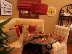 a corner table with two chairs and some food on it