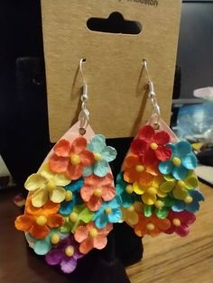 These hand made wood dangle earrings are so fun! They are painted and I used paper flowers and modge podge. Assorted colors Cute Multicolor Handmade Flower Earrings, Cute Handmade Multicolor Flower Earrings, Handmade Cute Multicolor Flower Earrings, Handmade Multicolor Flower Earrings, Hand Painted Multicolor Cute Earrings, Unique Multicolor Flower Earrings, Artsy Multicolor Flower Earrings, Whimsical Multicolor Dangle Flower Earrings, Multicolor 3d Flower Earrings