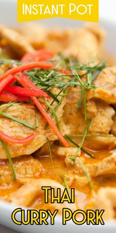 thai curry pork with red peppers in a white bowl