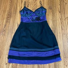 Moschino Cheap & Chic Black And Purple Gorgeous Party Dress. Spaghetti Straps. Waist Has A Embroidered Floral Design. Side Zipper. Us 8; Gb 10; F 38 Armpit To Armpit: 34” Waist: 28” Length: 35” This Is A Stunning Dress To Wear To A Party!! I Bought It And Never Had The Opportunity To Wear It And Then It Didn’t Fit Me Anymore!! I Shortened The Shoulder Strap A Little. But There Is 3-4” More Room To Lengthen It. If You Need It. Purple Black Party, Moschino Dress, Black Party Dress, Dress Spaghetti Straps, Moschino Cheap And Chic, Black Party Dresses, Black And Purple, Dress Spaghetti, Black Party