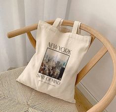 "New York Tote Bag, New York State Of Mind Tote, Shopping Bag, The City That Never Sleeps, New York City Bag, Beige Tote, Cotton Tote, NYC This 100% cotton bag comes in one size - 15\" x 16\"- perfect for everyday wear. While the canvas material shows off our designs, it's durable and will last for years. The bag features 20\" handles (made from the same canvas), making it easy to carry even with a week's worth of shopping. 100% cotton canvas Heavy fabric (12 oz/yd² (406.9 g/m Sewn-in label" New York Tote Bag, City Tote Bag, Beige Tote, Cute Tote Bags, City Bag, Bags Aesthetic, City That Never Sleeps, New York State, Printed Tote Bags