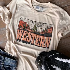 "Western" Desert Background Design Cream or Heather Harvest Graphic Tee 100% Combed & Ring-Spun Cotton Unisex Cut ~ Runs Roomy ~ If You Want A More Fitted Tee We Recommend You Size Down Women's Sizing Recommendations Small 0/2/4 Medium 4/6/8 Large 8/10/12 XL 12/14/16 2XL 16/18/20 3XL 20/22/24 ***These Are PRINTED/MADE TO ORDER! Please Allow 7-10 Business Days To Ship. If You Order Multiple Items, These Will Be Shipping Out SEPARATELY From Your Order. Western Tees, Charlie 1 Horse Hat, Moon Graphic Tee, Western Tee, Moon Graphic, Cute Country Outfits, Western Graphic Tees, Cowgirl Birthday, Giddy Up Glamour