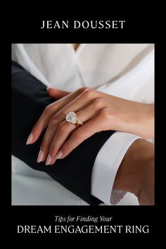 a woman's hand with a ring on her finger and the caption reads, this is for finding your dream engagement ring