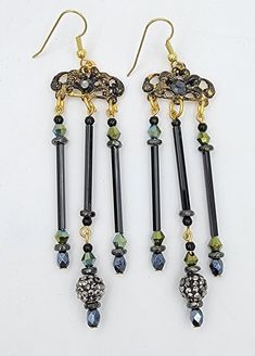 Beaded dangle Earrings Color:   Black/AB/gold Red/gold Length:  4 inches   Unique Vintage Beads in assorted dangle earring.  These earrings from ear wire to bottom dangle are 4 inches in length.  Earrings are an assortment of vintage glass, crystal, stone, and plastic beads.  These fun to wear and unique earrings are elegant and whimsical. Bead Dangles, Vintage Beads, Holiday Jewelry, Beaded Dangle Earrings, Red Bead, Crystal Stone, Plastic Beads, Beaded Stretch Bracelet, Earrings Vintage