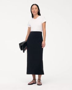 Classic, understated, and versatile - the Tube Skirt has a slim, body-gracing fit whose length can be adjusted by lifting, lowering, or folding the elasticated waist. For elevated casual, pair with the T-Shirt. This custom fabric features a premium organic cotton expertly knit together with lyocell. The lyocell in this Classic Fitted Cotton Pencil Skirt, Classic Cotton Fitted Pencil Skirt, Modern Fitted Cotton Skirt, Fitted Modern Lined Maxi Skirt, Modern Fitted Lined Maxi Skirt, Fitted Modern Maxi Skirt With Lined Skirt, Modern Fitted Maxi Skirt, Versatile Cotton Skirt For Work, Versatile Fitted Maxi Skirt For Work