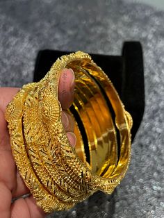 24ct Gold plated high quality bangles looks like real gold. Excellent quality bangles.  Set of 6 bangles.  Check my shop policy before making any purchase. Gold Stackable Bangle, 22k Gold Round Bangle, Stackable Gold Jewelry For Festivals, Gold Stackable Round Bangle, Gold-plated Stackable Gold Bangle, Gold Bangle For Festivals, Gold Plated Bangle For Festivals, Traditional Gold Stackable Bangle, Traditional Gold Plated Bangle