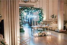 a table with candles and flowers on it