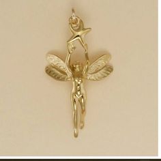 Gold Plated Fairy with Star Charm Pendant 1 1/4 inch, 31mm (Chain not included, for illustration only) LIFETIME REPLACEMENT GUARANTEE We will replace your item if it breaks during normal wear GOLD PLATING GUARANTEE If, in the rare event, the gold plating wears off, we will re-plate it for free The gold plating is 22 Karat over 925 sterling silver. Sterling Silver Chains ... https://www.etsy.com/listing/1340663831/sterling-silver-rope-chain-drawn-flat Gold Filled Chains ...  https://www.etsy.com/listing/1328079176/gold-filled-rope-chain-drawn-flat-cable CHAINS ARE NOT RETURNABLE EARRINGS Checkout 2 charms to place an order for a pair of earrings.  Message me at checkout that you would like earrings, or via Etsy convo after checkout.  There is a $4 re-stocking fee for returned earrings. Silver Fairy, Fairy Charms, Fairy Jewelry, Silver Chains, Jewelry Lookbook, Jewelry Inspo, Boyfriend Girlfriend, Pretty Jewellery, Star Charms