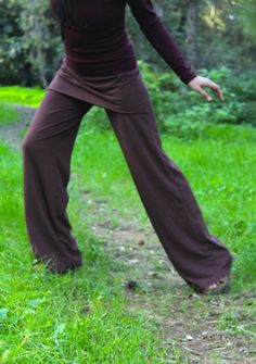 Hemp women pants, Skirted pants, Yoga pants, organic pants, organic trousers. Straight, wide, jersey pants, layered with a mini skirt attached on it. In a beautiful earth toned color, raisin/chocolate brown. Easy to wear pants that you will turn to again and again! For spring, summer, fall. ---Sizing--- Small: Waist 66-76cm - Length 109cm Medium: Waist 68-78cm -  Length 109cm Large: Waist 72-82cm - Length 109cm ---Color--- Shown here: Raisin rose, brown Be aware that the colors shown in photos d Yoga Skirt Pants, Fall Yoga Pants With Loosely Fitted Hips, Hippie Full-length Pants For Fall, Hippie Full Length Pants For Fall, Hippie Style Full Length Pants For Fall, Fall Hippie Pants, Hippie Style Full-length Bottoms For Fall, Hippie Full Length Bottoms For Fall, Hippie Style Full Length Bottoms For Fall