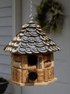 a bird house made out of wine corks