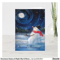 a card with a snowman on it and the words season's greeting