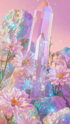 an artistic photo with flowers and crystals in the foreground, against a pastel background