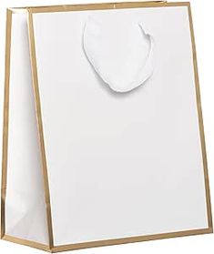 a white paper bag with gold trim