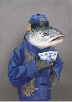 a statue of a fish wearing a blue coat and hat