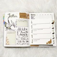 an open planner with writing on it sitting on top of a white furnishing