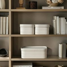 shelves with books, vases and other items on them