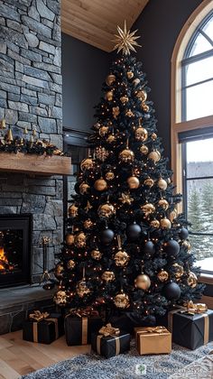 a decorated christmas tree in front of a fireplace with presents under it and a large window