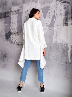 "Jacket, Linen coat, Asymmetric white jacket, Woman coat, White coat, White blazer, Asymmetric coat, Long coat  - UM-183-LN Linen white jacket with long sleeves. Suitable for your vacation and travel. I DO NOT CHARGE extra money for custom order.   Material - linen The model on the picture is size S.  Can be made in ALL SIZES. Enjoy this coat and always be in a good mood! ALL GARMENTS IN THIS SHOP ARE MADE ACCORDING TO YOUR MEASUREMENTS.  PLEASE GIVE YOUR SIZE (MEASUREMENTS) IN THE ETSY NOTE TO SELLER SECTION DURING THE TRANSACTION. For your convenience look at the table below for size reference.  How to measure yourself: * Bust - measure around the fullest part of your breast with bra included (not your bra size). * Waist - smallest part of torso * Hips - largest part of hip measurement * White Oversized Outerwear With Lapel Collar, Chic Outerwear With Asymmetrical Hem For Spring, Chic Spring Outerwear With Asymmetrical Hem, White Long Outerwear For Spring, White Long Spring Outerwear, Long White Spring Outerwear, Chic Oversized Asymmetrical Outerwear, Modern White Long Coat, Modern White Outerwear For Spring