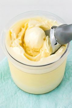 a bowl filled with ice cream on top of a blue towel