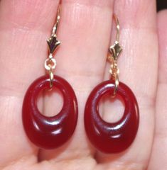 Quality 14K Genuine Red Jade Semi Roud Oval  Hoop Leverback Earrings You are buying a pair r of Vintage Old Stock High Polish Red Jade  hoops stones. These Red Jade  stones measure 20 mm x 15 mm. The whole earrings with leverbacks measures 35 mm. These are gorgeous. 5.6  Grams /  27.5  Carats Comfortable to Wear / Medium Size You will love wearing them. Elegant Small Hoop Red Earrings, Gift Oval Hoop Earrings With Lever Back, Red Hoop Jewelry For Formal Occasions, Red Hoop Pierced Jewelry, Red Pierced Hoop Jewelry, Red Hoop Pierced Earrings, Red Small Hoop Jewelry For Anniversary, Red Oval Classic Earrings, Classic Oval Red Earrings